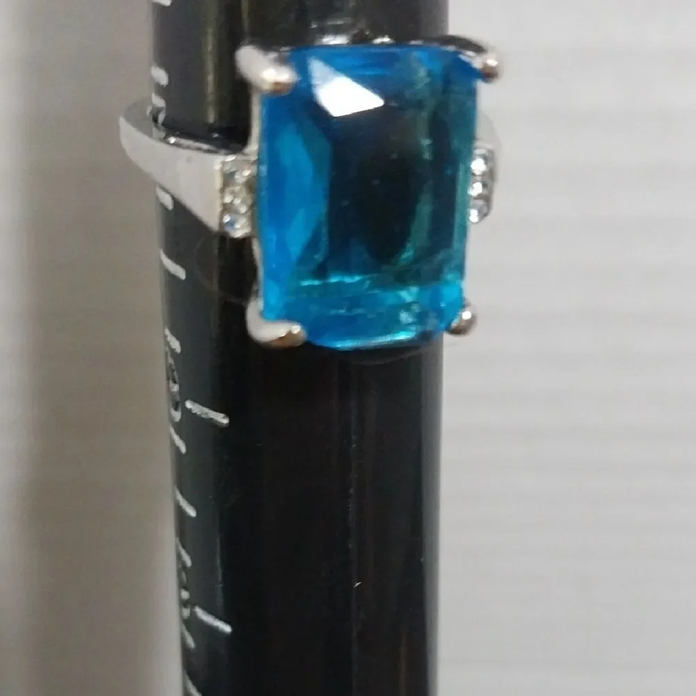 Unlisted Silver Ring with Vibrant Blue Gem..it Is In perfect Condition b